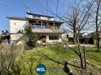 Bild (9f9b913f0863529a00c7b336f23c6c95): Stattliches 3-Familienhaus mit 2 Garagen und sch�nem Garten in ruhiger Ortsrandlage von Bempflingen.