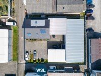 Bild (b39dbe73cfc829fccbffaf3d87802d08): Hochwertig modernisiert, sehr gepflegt! 3-Familien-Wohnhaus mit Doppelgarage und Gewerbe-Halle.
